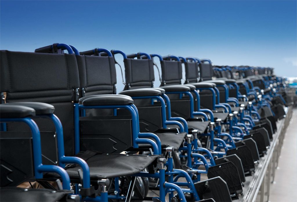 A row of INTCO wheelchairs